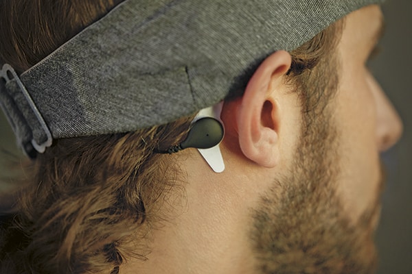 Self-adhesive sensor behind your ear